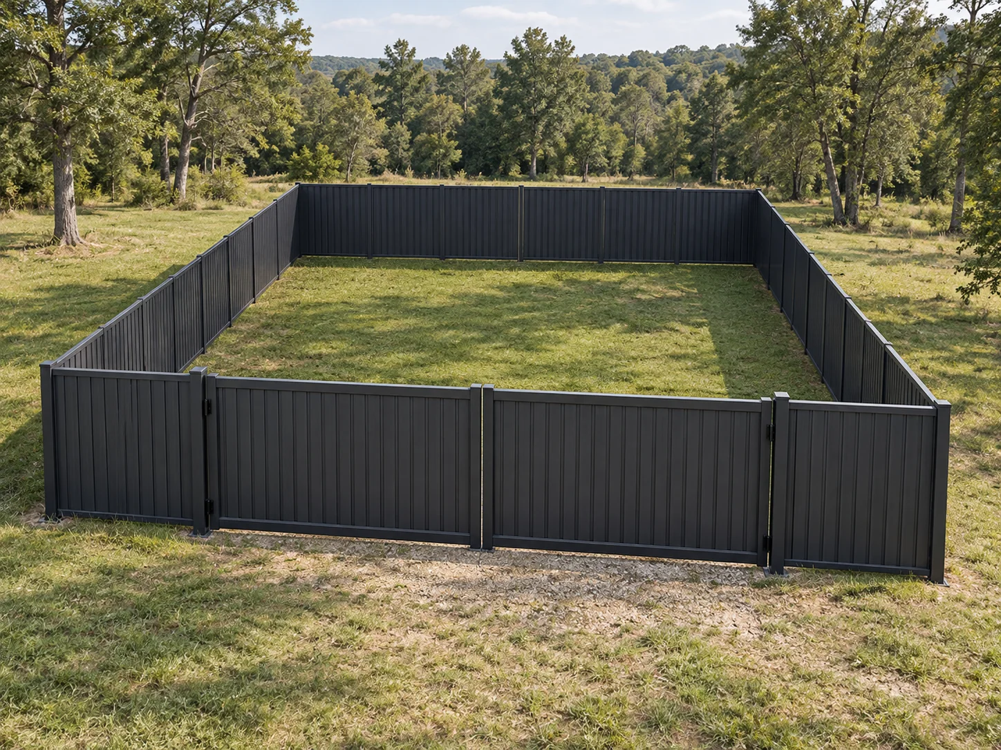Concept rendering of a charcoal steel privacy fence and driveway gate in a wooded estate setting